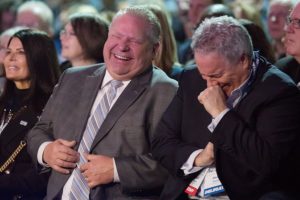 Ontario Premier Doug Ford Facebook List and Chief of Staff Dean French share a joke as they wait to hear Federal Conservative Leader Andrew Scheer speak at the Ontario PC Convention in Toronto on Saturday, November 17, 2018. THE CANADIAN PRESS/Chris Young